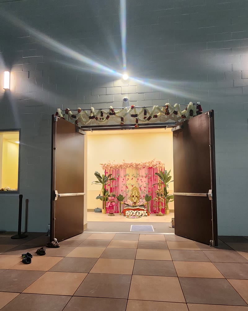 A Nani Event Decors ceremony setup seen through the venue doorway